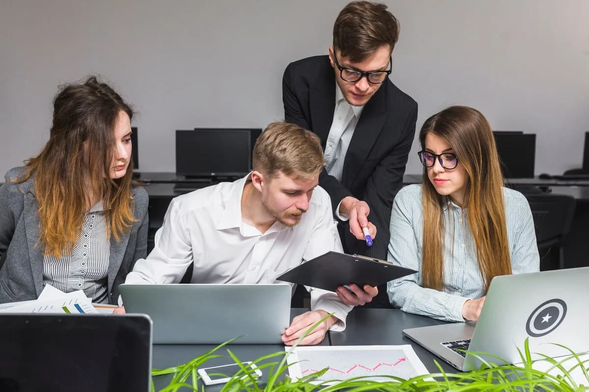 Professionals reviewing documents together
