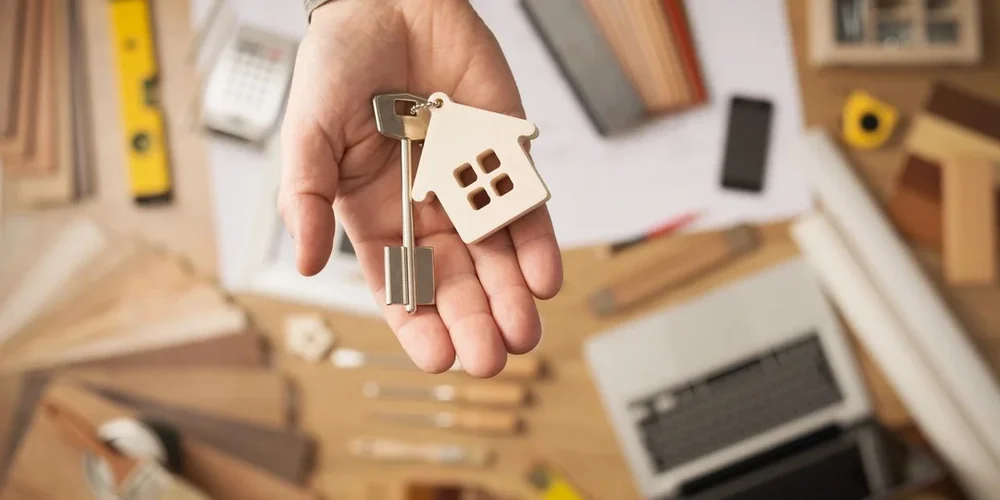 House keys handed over during a property transaction