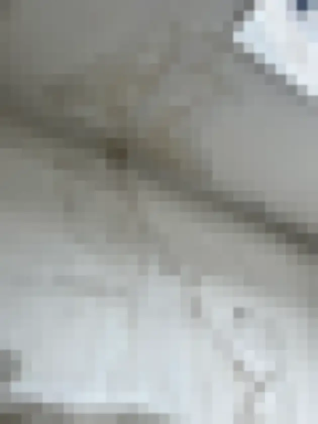 Upper corner and wall have winding dark discoloration and loose cable