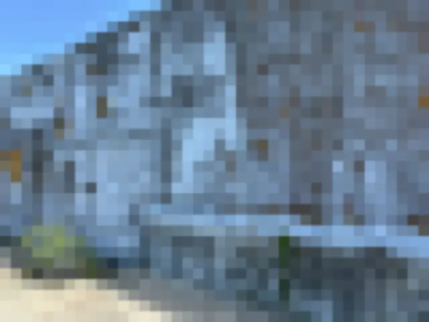 Weathered exterior wall surface viewed from outside